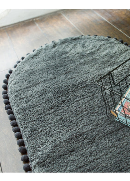 Ovale Badmat met Bommelrand van Polyester Antislip